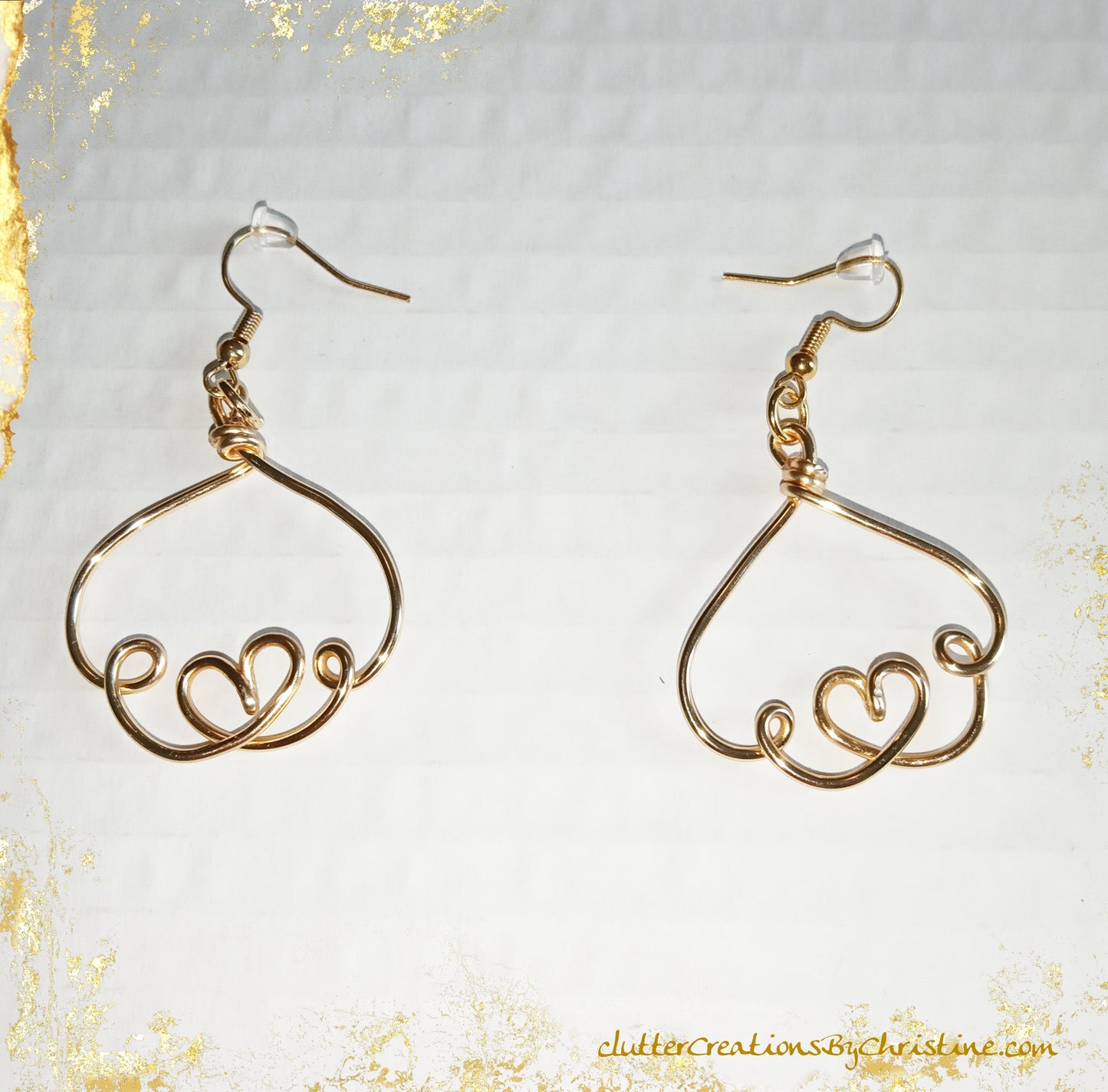 Handcrafted heart-shaped earrings! Made with tarnish-resistant copper wire and 18kt gold plated hooks, each pair is completely unique!