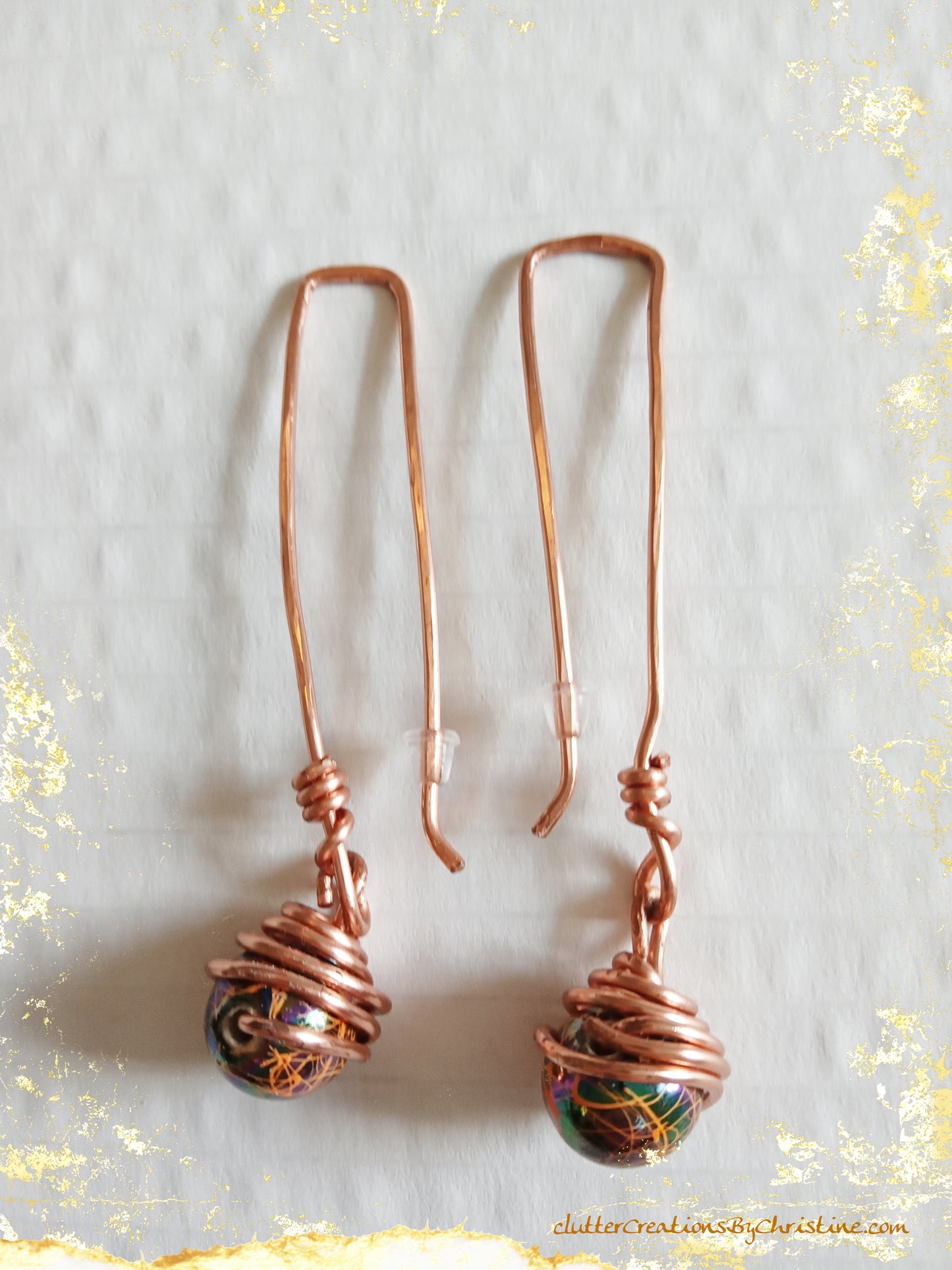 Handmade wire-wrapped statement beaded earrings. Crafted with tarnish-resistant copper wire and vibrant, one-of-a-kind beads!