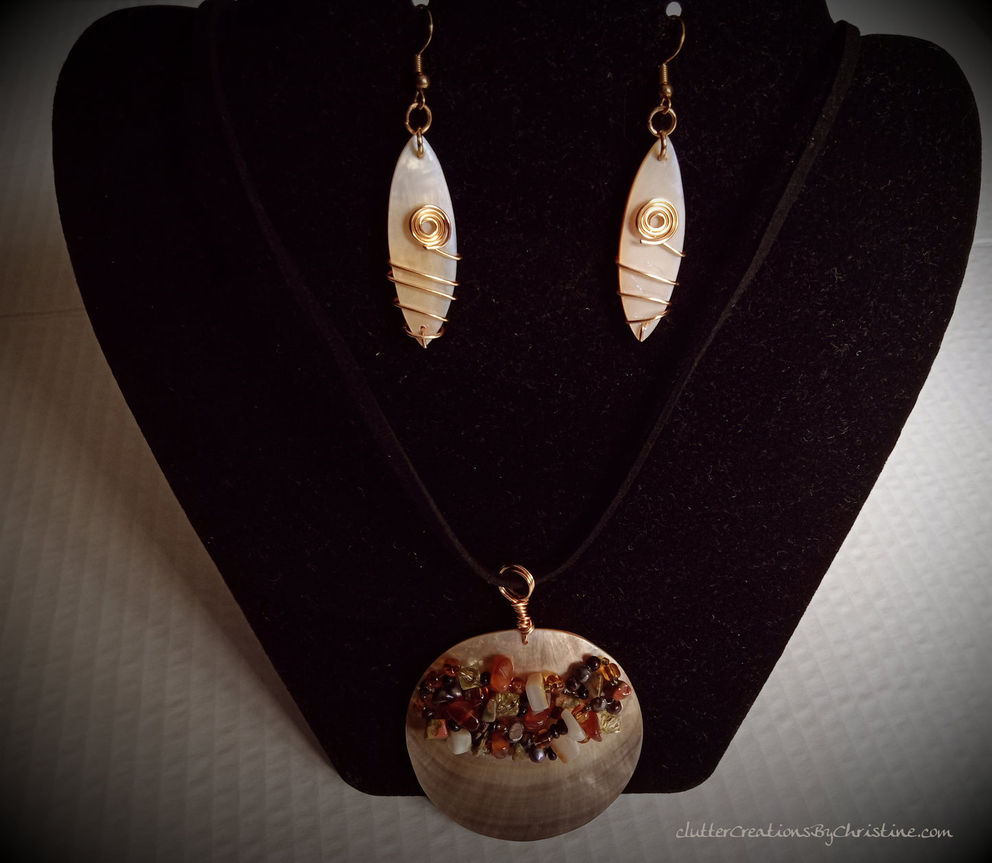 One-of-a-Kind earrings and necklace set handcrafted with genuine mother of pearl. Inspired by the beauty of the ocean and surf of the Texas Coast!