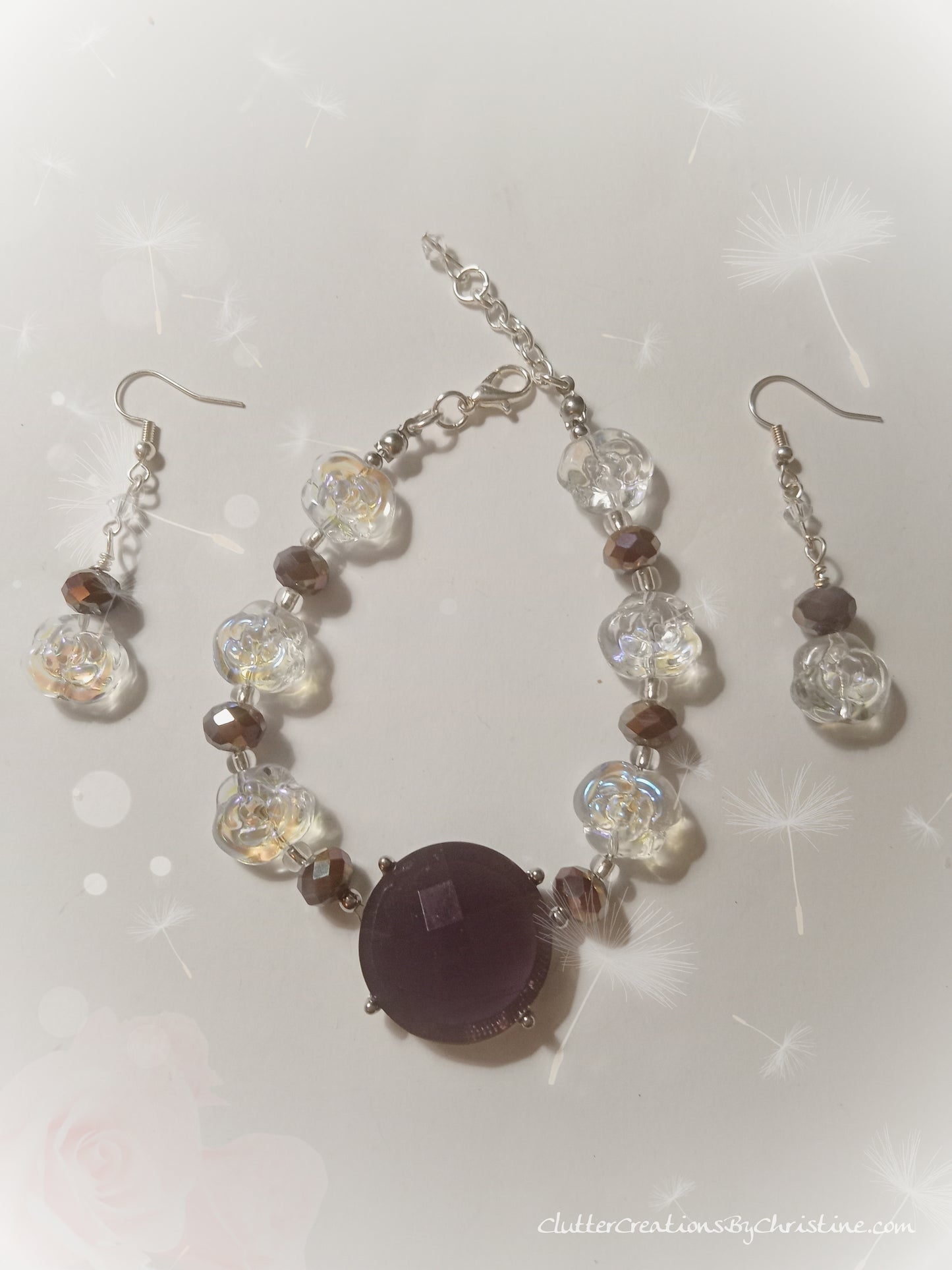 Beautiful elegant shimmering glass rose beaded bracelet! The deep purple tones of the beads add a touch of luxury to any outfit. Made with a silver chain extender, it's adjustable to fit all sizes. Make a statement with this stunning set!